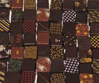 Array of rectangular chocolates with decorated flat tops