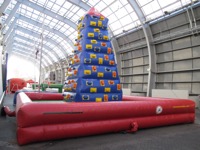 Inflatable rock-climbing tower